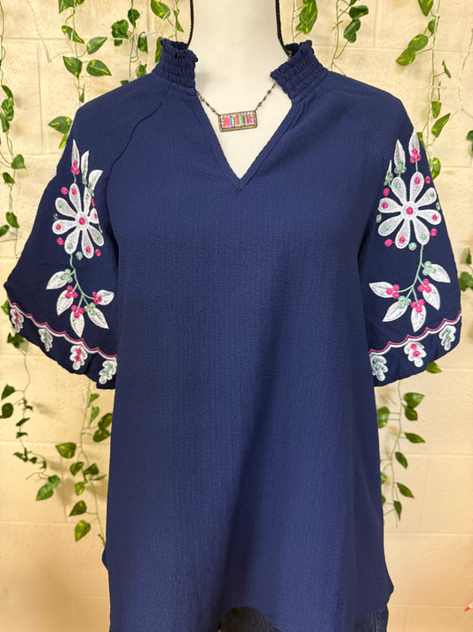 Blue floral embroidery puff blouse